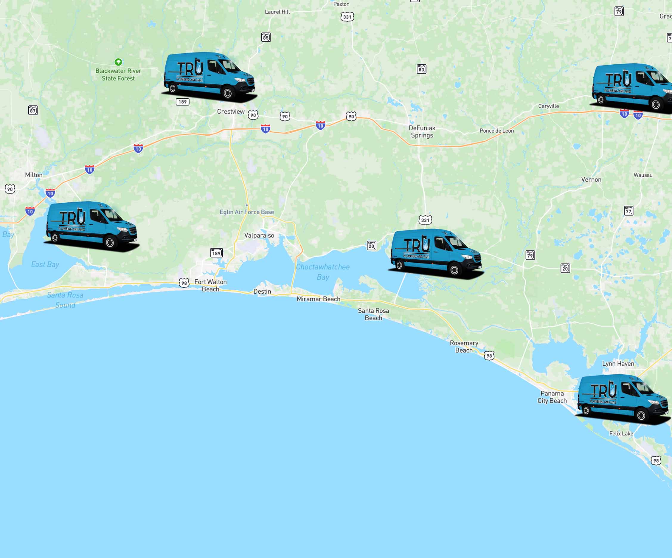 Map of the Florida Panhandle stretching from Navarre on the west to Panama City Beach on the east. Scattered across the map are blue Tru Plumbing and Gas work vans.